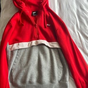 Nike hoodie, it has a few lent rolls